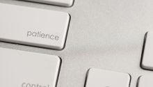 Photo of a keyboard with the word patience on one of the keys to illustrate the article How to Have More Patience.
